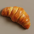 Freshly Baked Golden Flaky Croissant With Buttery Layers And Crispy Texture