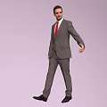 A Man In Gray Suit With Red Tie Standing Against Light Background