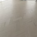 Light Colored Wooden Floor Components With Herringbone Parquet Patterns And Natural Texture