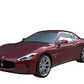 Red Maserati Coupe Sports Car With Sleek Body And Sporty Alloy Wheels