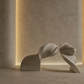 Neutral Concrete Wall Design With Warm Lighting And Sculptural Art Piece