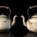Vintage White Enamel Teapots With Cracked Speckled Finish And Metal Handles And Wooden Accents