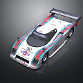 Marchin Racing VAV Shell Sponsored White Racing Car With Rear Wing And Red Blue Stripes