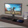 Gaming Computer Setup Featuring Monitor Keyboard Mouse Headphones On Wooden Desk With Green Plant