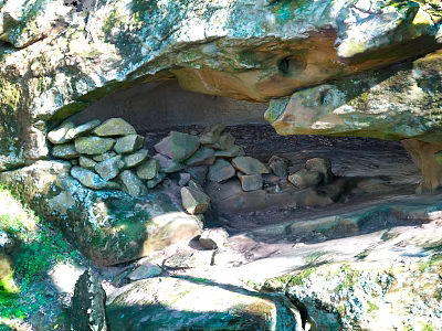 Natural Rock Cave Formation With Stacked Stones And Lush Green Vegetation 3d model