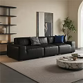 Black Leather Three Seater Sofa with Checkered and Blue Cushions in Living Room with Artwork