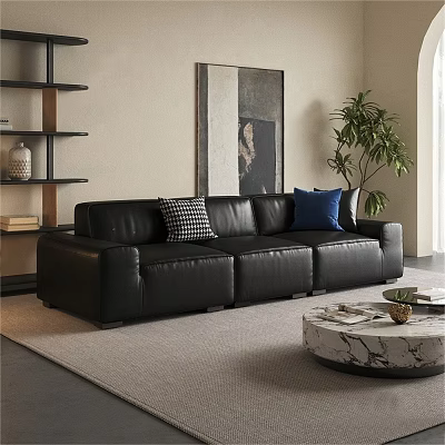 Black Leather Three Seater Sofa with Checkered and Blue Cushions in Living Room with Artwork 3d model