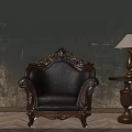 Vintage Leather Single Sofa With Carved Wooden Frame And Side Table Lamp Against Textured Wall