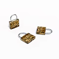 Three Golden Patterned Padlocks With Silver Shackles On White Background