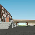 Modern School Building Complex With Red Brick Facade Green Courtyard Lawn And Students