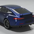 Blue Sports Sedan With Sleek Aerodynamic Body Sporty Front Grille And Alloy Wheels