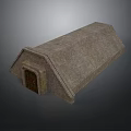 Exterior View Of Small Stone Building With Sloped Roof And Wooden Door