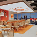 Shanxi Cuisine Restaurant With Bright Interior Cartoon Murals Orange Walls And Comfortable Seating