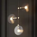Modern Pendant Lights With Circular Glass Shades And Golden Metal Frames Illuminated