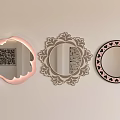 Three Decorative Mirrors with Pink Lighted Frame Intricate Floral Design and Heart Patterned Round Shape 3d model