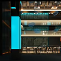 Modern Japanese Restaurant Interior With Stylish Blue Lighting And Wooden Dining Tables