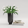 Fresh White Tulips in Black Vase with Bowl and Stacked Books on Minimalist Surface