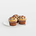 Delicious Muffins with Cream Frosting and Chocolate Chips on White Plate