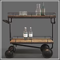 Vintage Two Tier Serving Cart With Wooden Shelves Metal Frame And Glassware