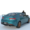Blue Sports Car With Man Sitting On Hood Using Mobile Phone And Orange Rims
