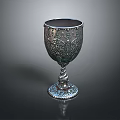 Decorative Ornate Metallic Goblet With Intricate Floral Patterns And Twisted Base