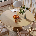 Natural Minimalist Dining Table Set With Round Wooden Table Chairs Fruit Bowl And Books