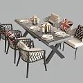 Modern Outdoor Woven Dining Table Set With Decorative Patterned Cushions And Neat Dinnerware Settings