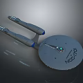 Display Shelf Showcasing Collectible NCC 1701 Starship Model with Detailed Design and Blue Engine Parts