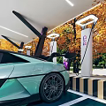 Modern Parking Lot Featuring Covered Canopy Charging Stations And Parked Cars Amid Autumn Trees