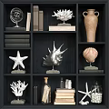 Decorative Ornament Set with Globe Starfish Shell Coral Vase and Books on Black Shelf
