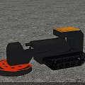 Tracked Industrial Equipment With Orange Circular Component For Ground Processing