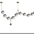 Modern Chandelier With White Spherical Shades And Golden Metal Frame For Elegant Contemporary Home Decor