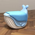 Whale Shaped Kids Chair With Blue Cushion And White Body Design