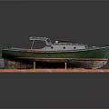 Detailed Vintage Wooden Model Boat With Green Hull And Classic Design On Display Stand
