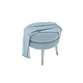 Light Blue Stool With Layered Seat Cushions Legs Gold Accents Draped Blanket