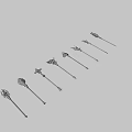 Ornate Weapon Collection Showcasing Various Staffs With Gemstone Inlays And Metal Accents