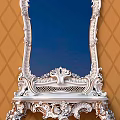 Ornate White Dressing Table With Carved Mirror And Orange Diamond Pattern Wall