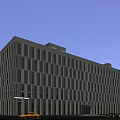 Aerial Planning of Modern Office Building With Glass Curtain Wall at Night