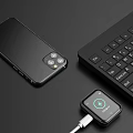 Black Wireless Headphones and Bluetooth Speaker with High Quality Sound and Smart Connectivity