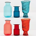 Colorful Ceramic Vessels With Varied Shapes And Vibrant Blue Red Orange Tones