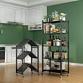 Modern Kitchen Interior With Black Metal Shelving Unit On Wheels Holding Bottles Fruits And Plants