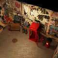Urban Street Setting With Graffiti Covered Walls Red Telephone Booth And Bench