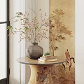 Decorative Vase With Dried Branches And Small Flowers On Round Wooden Table With Traditional Mural