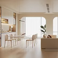 Modern Living and Dining Room Interior With Beige Sofa Dining Table Chairs Pendant Lights and Plants