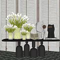 Elegant Console Table with White Flower Bouquets Decorative Sculptures Books Marble Top and Black Pedestal