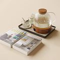 Minimalist Modern Glass Teapot With Wooden Lid On Tray And Books Over Beige Background