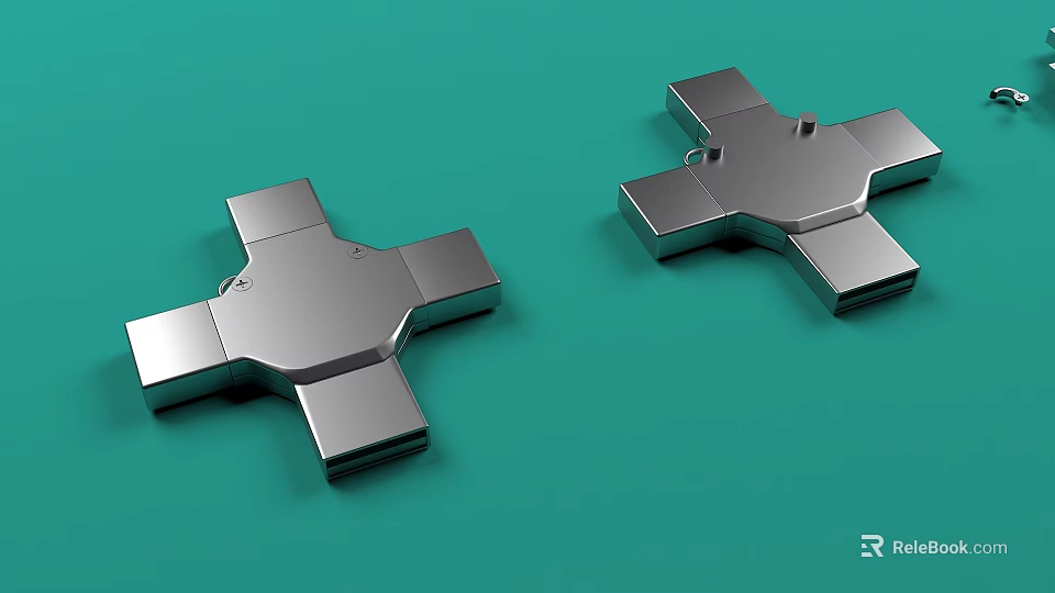 Two Silver Cross Shaped Metal Objects Placed On Green Background 3d model 