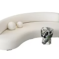 White Curved Multi Person Sofa With Two Spherical Cushions And Patterned Stool 3d model