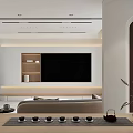 Modern Living Room Interior Design With Curved Sofa Round Coffee Table Fireplace And Recessed Lighting