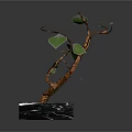 Decorative Potted Plant With Curved Brown Trunk Green Leaves And Black Marble Base